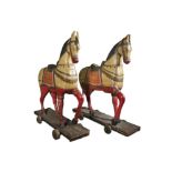 A LARGE PAIR OF INDIAN LACQUERED PROCESSIONAL HORSES, each painted with traditional headdress and