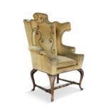 A QUEEN ANNE STYLE WALNUT FRAMED WING BACK ARMCHAIR, with embroidered fabric upholstery on