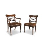 A SET OF 10 GEORGE IV MAHOGANY RAIL BACK DINING CHAIRS, with x frame back rail seats upholstered