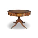 A GEORGE IV MAHOGANY CIRCULAR DRUM TABLE, the top with tooled green leather scriver,