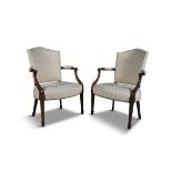 A PAIR OF UPHOLSTERED MAHOGANY FRAMED BEDROOM ARMCHAIRS, covered in patterned beige fabric