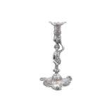 AN IRISH GEORGE III CAST SILVER FIGURAL CANDLESTICK IN THE ROCOCO TASTE, Dublin c.