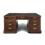 A GEORGE III STYLE MAHOGANY MINIATURE PARTNERS DESK, fitted with frieze drawers and false drawers,