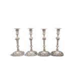 A FINE SET OF FOUR GEORGE II IRISH CAST SILVER CANDLESTICKS, Dublin c.1750, mark of George Hill,