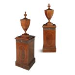 A PAIR OF GEORGE III MAHOGANY PEDESTALS, URNS AND COVERS, each six sided urn with boxwood strung