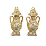 A PAIR OF VICTORIAN STAFFORDSHIRE PORCELAIN ROCKINGHAM STYLE VASES AND COVERS, the cover with