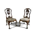 A RARE PAIR OF IRISH WALNUT CHAIRS, C.1710, the moulded backs with vase shaped splats,