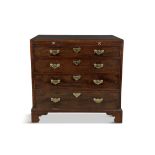 A GEORGE III MAHOGANY RECTANGULAR CHEST, with moulded rim above a brushing slide and four long