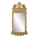 A GEORGE III GILTWOOD AND GESSO PIER MIRROR, with broken architectural pediment centred by an