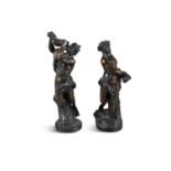 A PAIR OF BRONZE BACCHANALIAN FIGURES, French 19th century, she holding a garland with grapes,