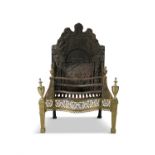 A GEORGE III CAST BRASS AND IRON FRAMED FIRE GRATE, the tall cast back decorated with bellflowers,