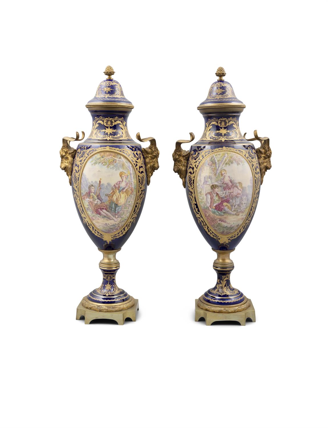 A PAIR OF 19TH CENTURY 'SEVRES STYLE' PORCELAIN VASES AND COVERS, one signed 'C.