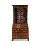 ***ADDITIONAL LOT*** A GEORGE III MAHOGANY BUREAU BOOKCASE, with moulded dentil cornice above twin