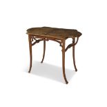 A FRENCH ART NOUVEAU INLAID FRUITWOOD OCCASIONAL TABLE BY GALLE, the shaped top inlaid with