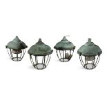 A SET OF FOUR BRONZE LANTERNS, of octagonal tapering design. Each 77cm high Provenance: