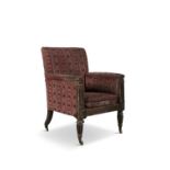 A GEORGE IV MAHOGANY ARMCHAIR, upholstered in tapestry stripped fabric, the arm supports capped