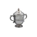 A GEORGE I SILVER TWO-HANDLE CUP AND COVER, London c.1726, makers mark of Richard Bayley,