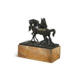 FRENCH SCHOOL, 19TH CENTURY Two stallions in opposing positions, on a naturalistic ground Bronze,