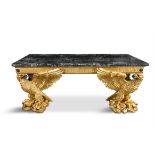 A GEORGIAN STYLE LARGE GILTWOOD SIDE TABLE, the simulated black variegated marble top raised