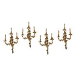 ***PLEASE NOTE: THESE SCONCES ARE GILTWOOD*** A SET OF FOUR 19TH CENTURY 'ROCOCO' GILTWOOD