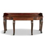 A 19TH CENTURY IRISH MAHOGANY BREAKFRONT SERVING TABLE, with three quarter gallery back,