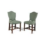 A PAIR OF UPHOLSTERED MAHOGANY FRAMED SHIELD BACK PARLOUR CHAIRS, C.1760, on tapering square legs