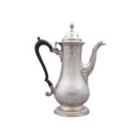 A GEORGE III SILVER COFFEE POT, London c.1763, makers mark of William Cripps, of plain baluster