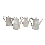 § FOUR SILVER TAPERED HEXAGONAL COFFEE POTS, Dublin (date mark rubbed), by West & Sons,