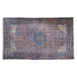 ***ADDITIONAL LOT*** A FINE SEMI-ANTIQUE HAMADAN CARPET, Persia, c.1930, the central medallion on a