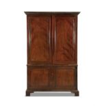 A GEORGE III MAHOGANY ESTATE CABINET, the dentil moulded cornice carved with twin fielded