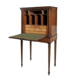 A GEORGE III YEWOOD VENEERED SECRETAIRE CABINET, probably Irish, the crossbanded rectangular top