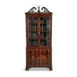 A GEORGE III INLAID MAHOGANY CORNER CABINET, with swan neck pediment centered with an urn above