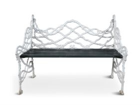 A 19TH CENTURY CAST IRON COALBROOKE DALE STYLE TWO SEAT GARDEN BENCH, the naturalistic cast