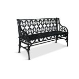 A PAIR OF VICTORIAN BLACK PAINTED CAST IRON GARDEN BENCHES, in Gothic style, the rectangular back