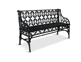 A PAIR OF VICTORIAN BLACK PAINTED CAST IRON GARDEN BENCHES, in Gothic style, the rectangular back