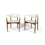 DAN JOHNSON A pair of 'viscount chairs' by Dan Johnson for Selig. Walnut brass and cream leather.