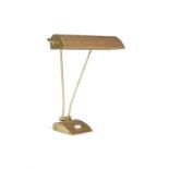 DESK LAMP A brass and faux timber desk lamp attributed to Eileen Gray. 35.5 x 16 x 45cm (h)