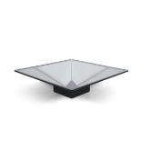 COFFEE TABLE A mirrored geometric coffee table with a glass top, lacquered timber base. c.1980.