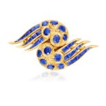 A SAPPHIRE DOUBLE CLIP BROOCH, BY RENÉ BOIVIN, CIRCA 1955 Composed of two stylised wings set