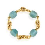 A HARDSTONE AND GOLD BRACELET, BY CARLO WEINGRILL, CIRCA 1960 The anchor-link chain interspersed