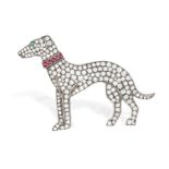 A DIAMOND, RUBY AND EMERALD NOVELTY BROOCH The stylised greyhound set throughout with single-cut