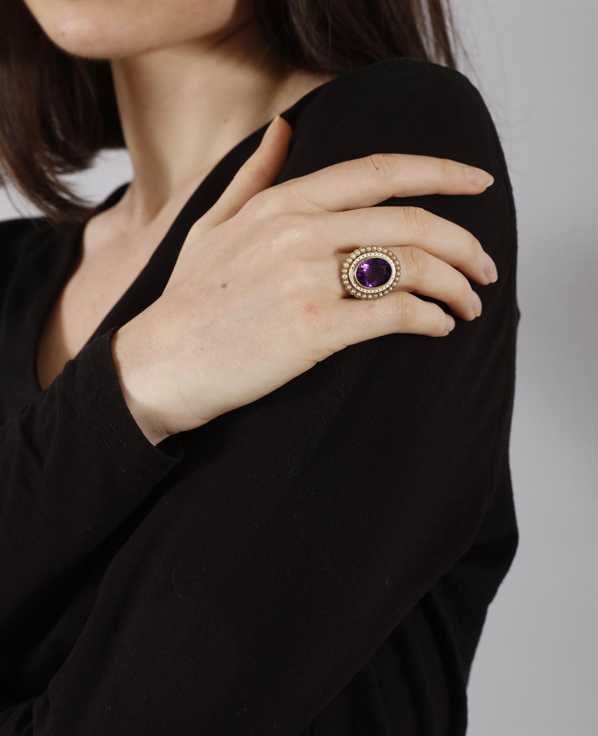 A VICTORIAN AMETHYST, ENAMEL AND SEED PEARL DRESS RING The oval-shaped amethyst within an white - Image 5 of 5