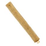 A MID 20TH CENTURY GOLD BRACELET, CIRCA 1950 The articulated bracelet, of openwork design with a