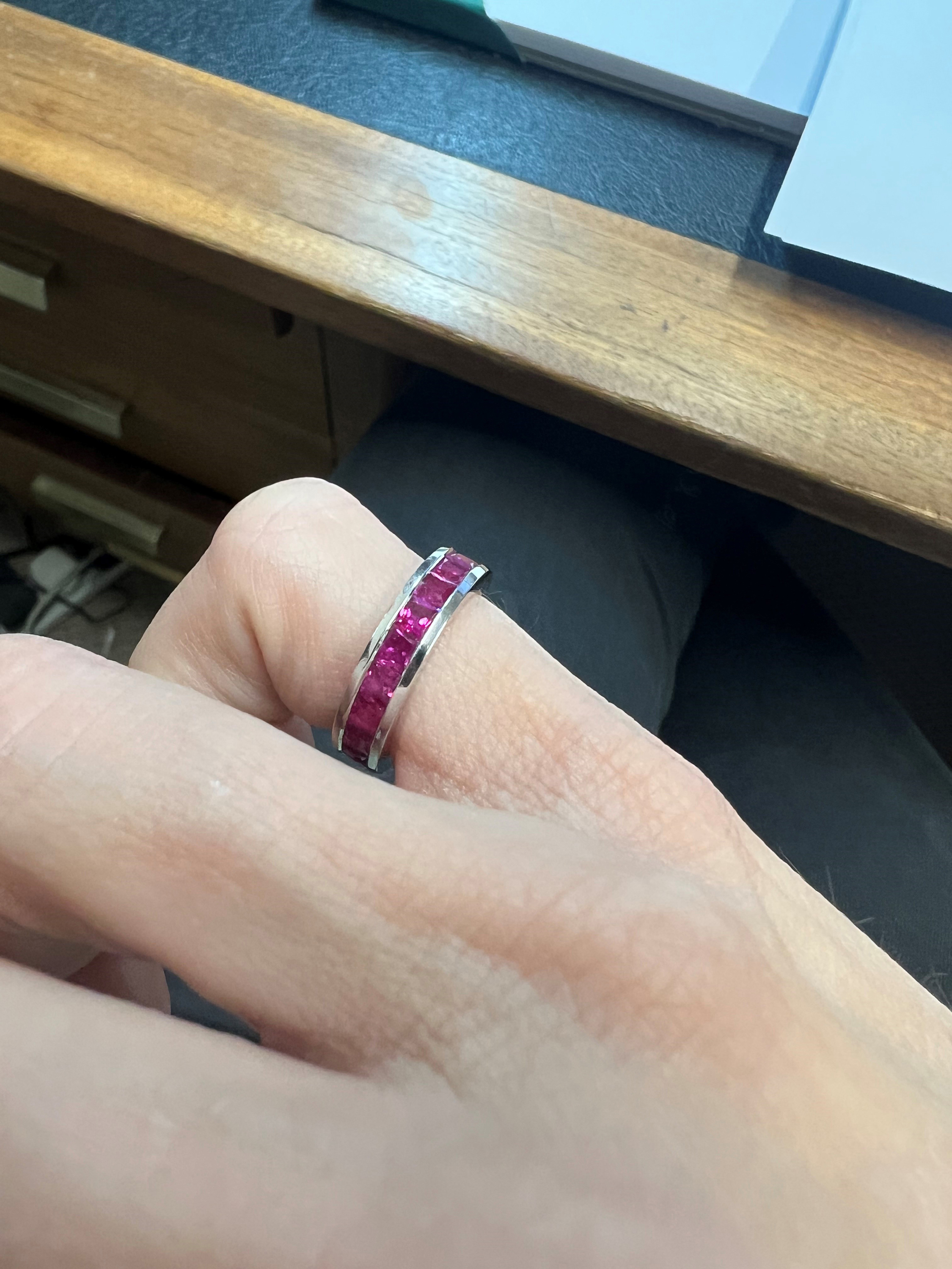 A RUBY ETERNITY RING, BY GRAFF The continuous row of square-cut rubies within channel-setting, - Image 7 of 8