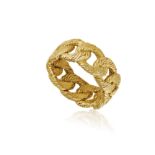 A GOLD DRESS RING, FRENCH, CIRCA 1970 * This lot is sold without a reserve Composed of a