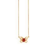 A RUBY AND DIAMOND PENDANT ON CHAIN Designed as a butterfly centring an oval-shaped ruby for