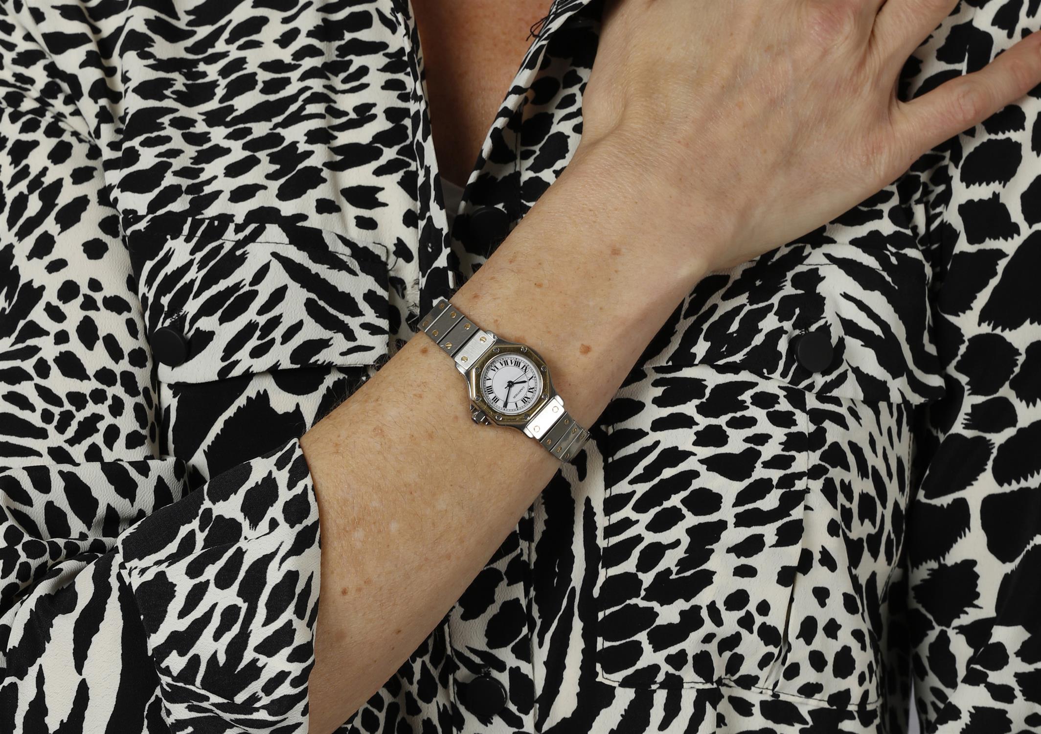 A LADY'S STAINLESS STEEL AND GOLD AUTOMATIC 'SANTOS' BRACELET WATCH, BY CARTIER, CIRCA - Image 4 of 4