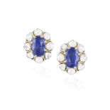 A PAIR OF SAPPHIRE AND DIAMOND CLUSTER EARRINGS Each oval-shaped sapphire within a rose-cut