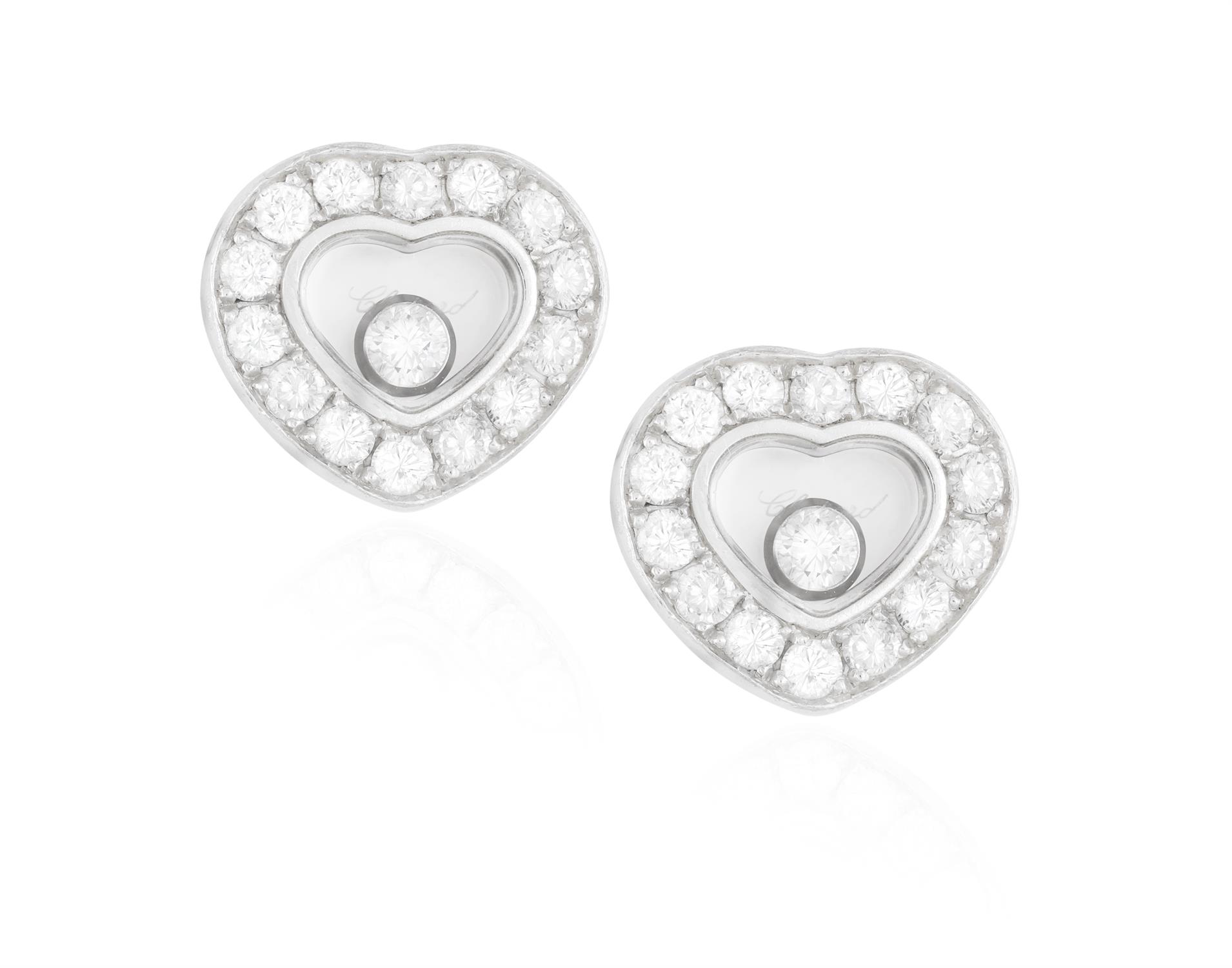 A PAIR OF 'HAPPY DIAMOND' EARRINGS, BY CHOPARD Each heart-shaped glazed compartment containing a