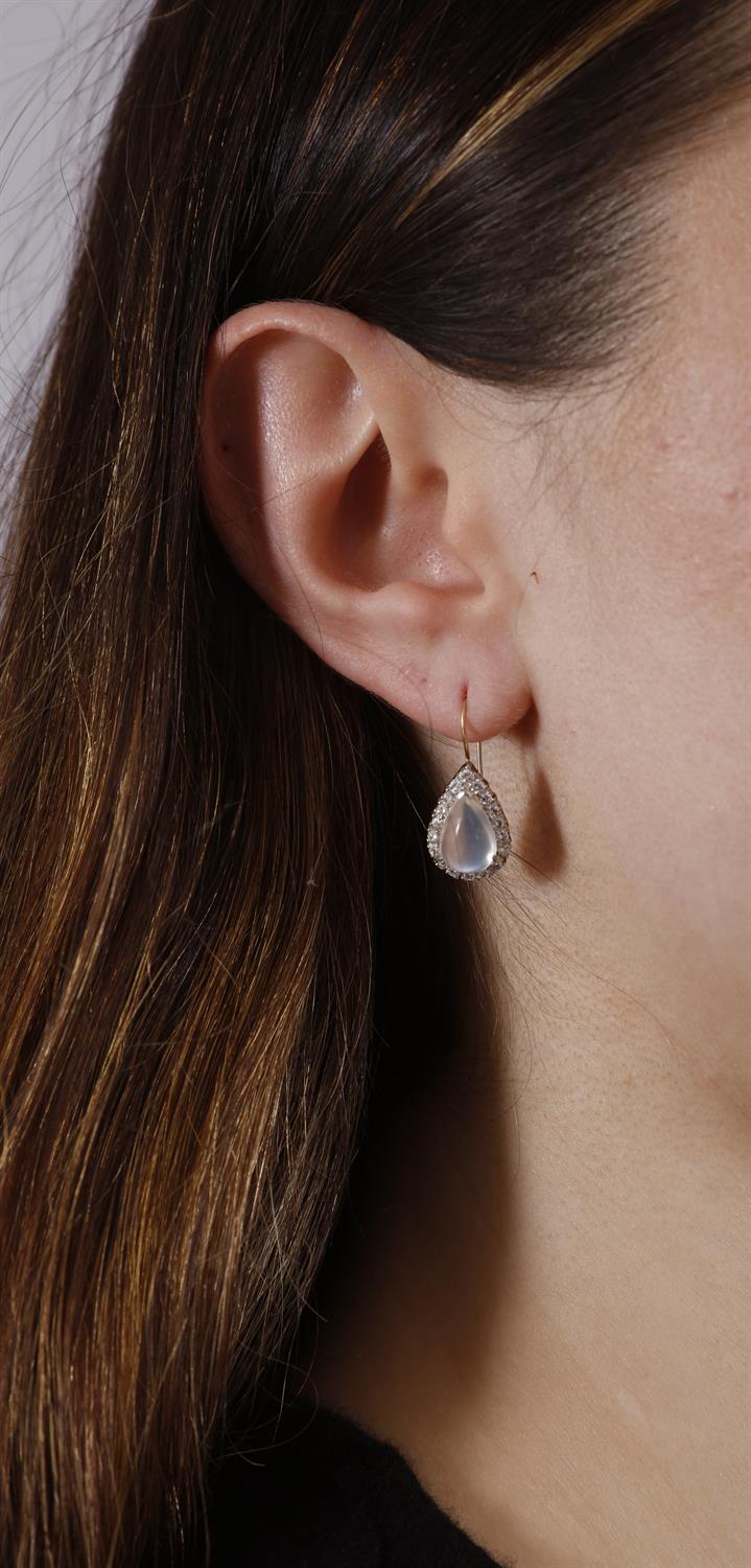 A PAIR OF MOONSTONE AND DIAMOND PENDENT EARRINGS Each composed of a pear-shaped cabochon - Image 3 of 3